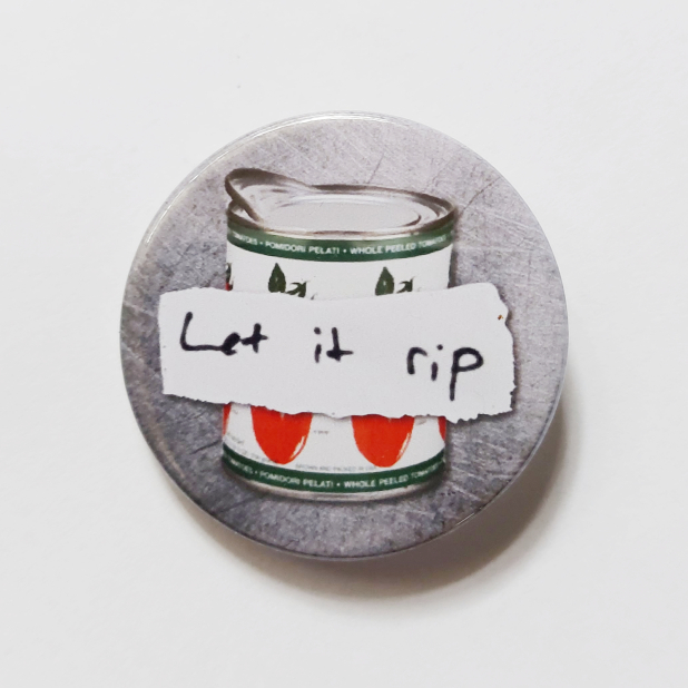 Round badge with silver background, can of tomatoes, "Let it Rip" banner